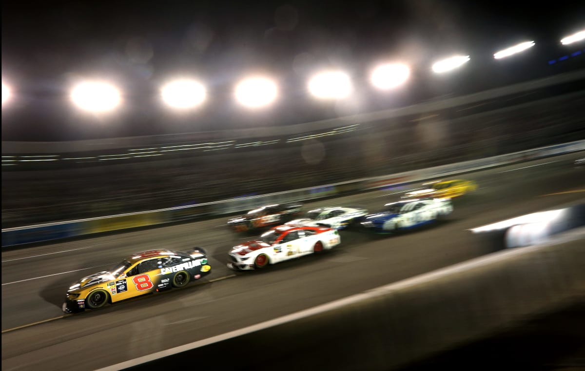 Daniel Hemric's No. 8 Caterpillar Chevrolet leads a pack of cars into the corner during Saturday night's Cup race at Richmond Raceway.
