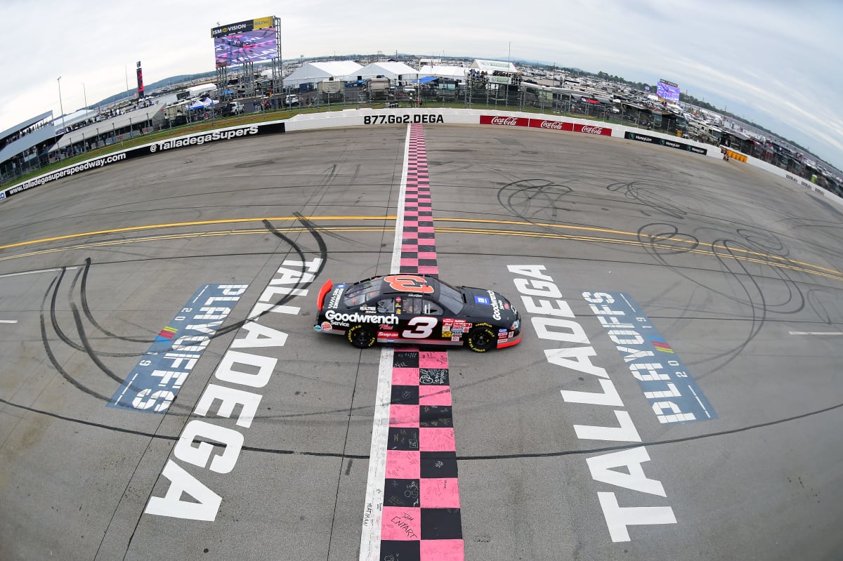 Dale Earnhardt's No. 3 GM Goodwrench Chevrolet crosses the Talladega Superspeedway finish line for the first time in 19 years after winning the Oct. 15, 2000 race, which would be Earnhardt's final win.