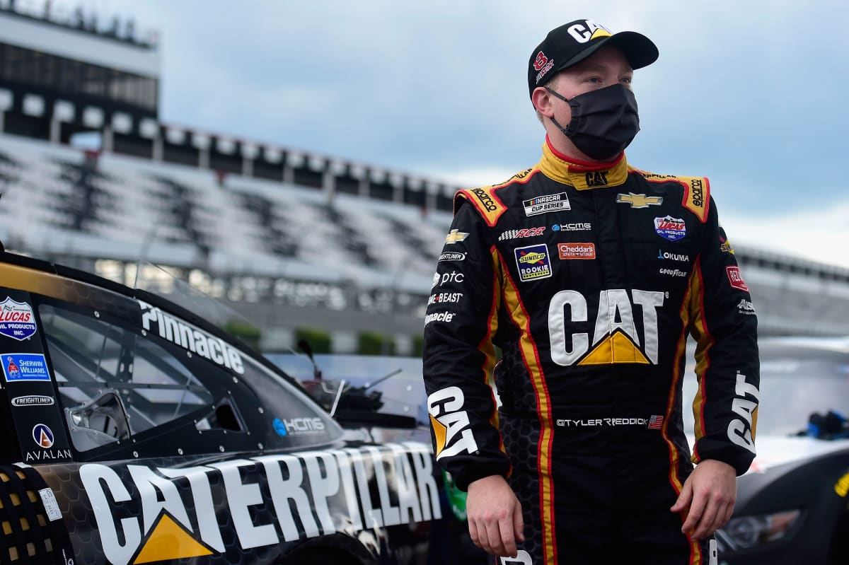 LONG POND, PENNSYLVANIA - JUNE 28: Tyler Reddick, driver of the #8 Caterpillar Chevrolet, stands on the grid prior to the NASCAR Cup Series Pocono 350 at Pocono Raceway on June 28, 2020 in Long Pond, Pennsylvania. (Photo by Jared C. Tilton/Getty Images) | Getty Images