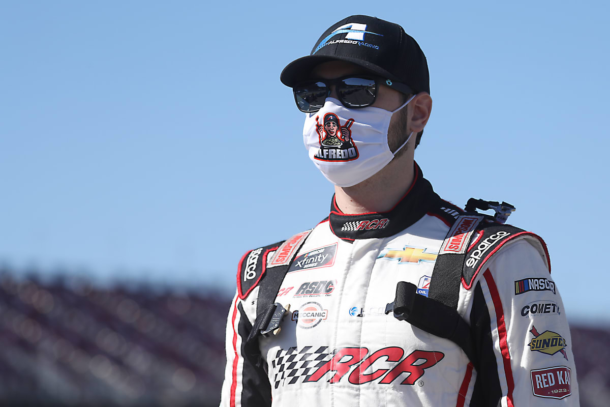 TALLADEGA, ALABAMA - OCTOBER 03: Anthony Alfredo, driver of the #21 Ceco Building Systems Chevrolet, walks the grid prior to the NASCAR Xfinity Series Ag-Pro 300 at Talladega Superspeedway on October 03, 2020 in Talladega, Alabama. (Photo by Chris Graythen/Getty Images) | Getty Images