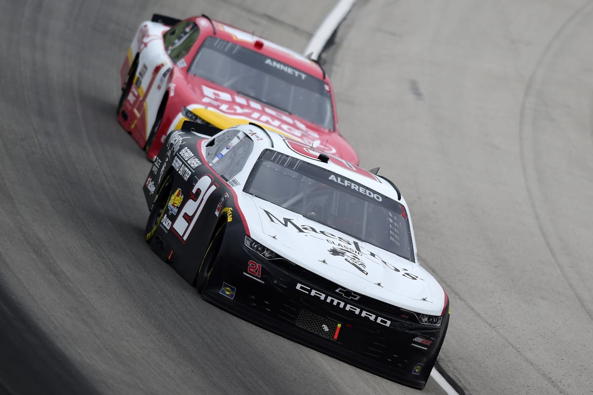 FORT WORTH, TEXAS - OCTOBER 24: Anthony Alfredo, driver of the #21 Maestro's Classic Chevrolet, and Michael Annett, driver of the #1 Pilot/Flying J Chevrolet, race during the NASCAR Xfinity Series O'Reilly Auto Parts 300 at Texas Motor Speedway on October 24, 2020 in Fort Worth, Texas. (Photo by Jared C. Tilton/Getty Images) | Getty Images