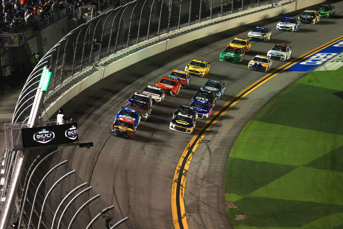 DAYTONA BEACH, FLORIDA - FEBRUARY 14: Austin Dillon, driver of the #3 Bass Pro Shops Chevrolet, and Chase Elliott, driver of the #9 NAPA Auto Parts Chevrolet, lead the field during the NASCAR Cup Series 63rd Annual Daytona 500 at Daytona International Speedway on February 14, 2021 in Daytona Beach, Florida. (Photo by Mike Ehrmann/Getty Images) | Getty Images
