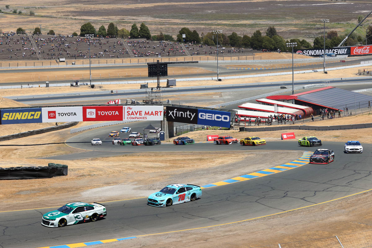 SONOMA, CALIFORNIA - JUNE 06: Austin Dillon, driver of the #3 Congressional Sportsmen's Chevrolet, and Scott Heckert, driver of the #78 Surface Sunscreen Ford, race during the NASCAR Cup Series Toyota/Save Mart 350 at Sonoma Raceway on June 06, 2021 in Sonoma, California. (Photo by Carmen Mandato/Getty Images) | Getty Images