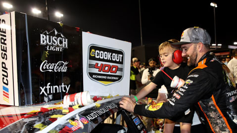 Austin Dillon places the winner sticker on his No. 3 Richard Childress Racing Chevrolet after his NASCAR Cup Series win at Richmond Raceway.