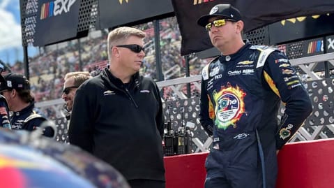 Andy Street, crew chief of the No. 8 RCR Chevrolet, speaks with Kyle Busch before a NASCAR Cup Series race.