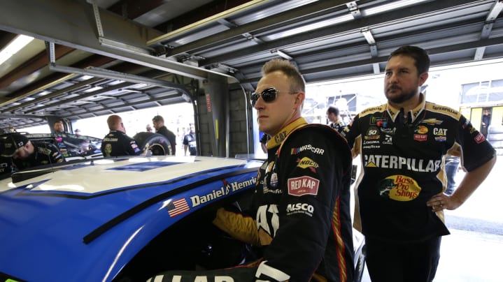 Daniel Hemric boards his No. 8 Okuma Chevrolet Camaro ZL1 before opening practice at New Hampshire Motor Speedway.