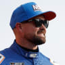 Ricky Stenhouse Jr. looks on.