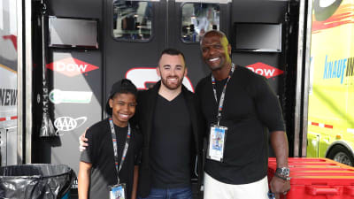 Austin Dillon poses for a photo with actor Terry Crews and his son.