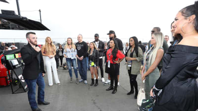 Austin Dillon talks with the cast of the reality show WAGS.