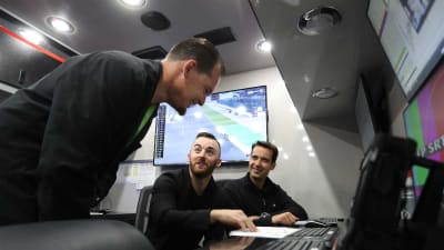 Austin Dillon gives American Ethanol Formula DRIFT driver Kyle Mohan a look at the technology inside the No. 3 hauler.