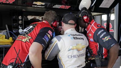 The No. 2 KC Motorgroup team studies data before making way to the track for opening practice at Michigan International Speedway.