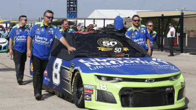 The No. 8 team brings their Liberty National Camaro ZL1 from the inspection line to their garage stall ahead of final practice.