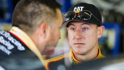 Daniel Hemric talks strategy with his team before the final practice session at Pocono Raceway.