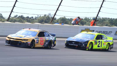 Daniel Hemric takes a spot from the No. 21 on the track.