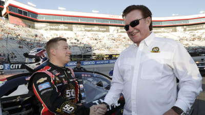 Team owner Richard Childress shakes Tyler Reddick's hand on the grid prior to Friday night's NASCAR Xfinity Series race at Bristol Motor Speedway.