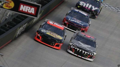 Daniel Hemric races side-by-side with Darrell Wallace Jr. in the opening stage of Saturday night's race at Bristol Motor Speedway.