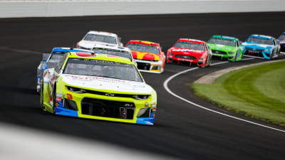 Austin Dillon leads a pack of cars late in Sunday's Brickyard 400 at Indianapolis Motor Speedway. Dillon suffered damage early on pit road, but recovered to earn a 12th-place finish. (HHP/Barry Cantrell)