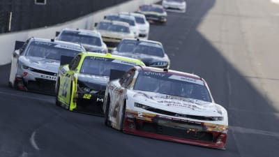 Tyler Reddick's No. 2 Anderson's Maple Syrup Chevrolet leads a pack of cars into Turn 1 during Saturday's NASCAR Xfinity Series race at Indianapolis Motor Speedway.  (HHP/Garry Eller)