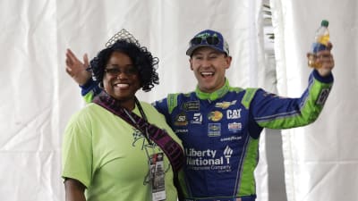 Daniel Hemric leads a group of Liberty National guests in singing happy birthday to one of the Liberty National agents prior to Sunday's race at Indianapolis Motor Speedway. (HHP/Garry Eller)
