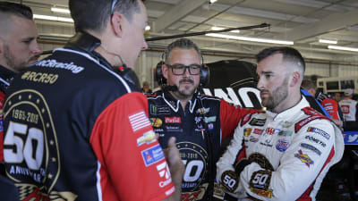 Austin Dillon discusses the handling of his car with crew chief Danny Stockman and the team of engineers after final practice.