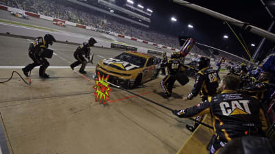 Daniel Hemric's No. 8 Caterpillar Chevrolet hits the sign on his final pit stop of the night.
