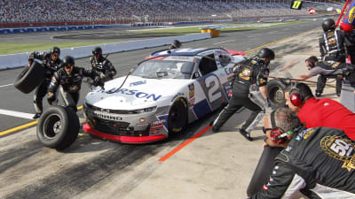 Tyler Reddick sits on pit road as the crew services the No. 2 Emerson Chevrolet during Saturday's race at the Roval. Reddick fought back to finish second.