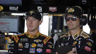 Daniel Hemric and crew chief Luke Lambert stand in the Cup Series garage waiting for the start of final practice at Dover.