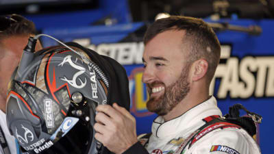 Austin Dillon prepares to climb in the No. 3 Roland Chevrolet for opening Cup Series practice at Kansas Speedway.