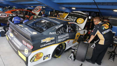The No. 8 Chevrolet Accessories team works on the balance of their Camaro ZL1 in between practice runs.