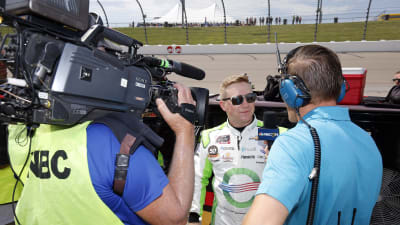 Tyler Reddick stops to chat with the media before taking the grid for his qualifying laps.