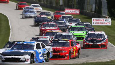Tyler Reddick's No. 2 Roland Chevrolet leads the outside line on a restart as the field works through the sweeping right-hand corner during Saturday's race at Road America.