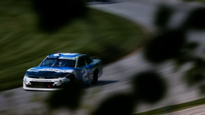 Tyler Reddick's No. 2 Roland Chevrolet races around a right-hand corner during Saturday's race at Road America.