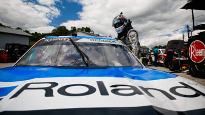 Tyler Reddick climbs in the No. 2 Roland Chevrolet for opening practice at Road America.