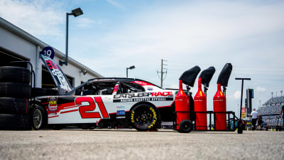 The No. 21 Eat Sleep Race team works hard to dial in Joe Graf Jr.&apos;s Camaro before Thursday&apos;s practice sessions.