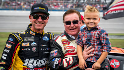 Former RCR driver Clint Bowyer and his son Cash stop by the 2000 No. 3 GM Goodwrench Chevrolet to take a picture with Richard Childress.