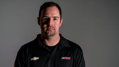 Richard Childress climbs in the driver seat of the No. 3 GM Goodwrench Chevrolet for the parade laps around Talladega Superspeedway.