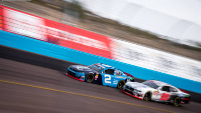Tyler Reddick's No. 2 Chevrolet races with fellow playoff contender Chase Briscoe in the final stage of Saturday's NASCAR Xfinity Series race at ISM Raceway. Reddick finished third and advanced to the Championship 4 at Homestead-Miami Speedway.