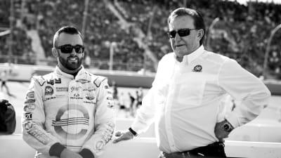 Austin Dillon and Richard Childress share a moment before the pre-race activities Sunday at ISM Raceway.