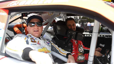 Tyler Reddick sits in the passenger side of Kaz Grala's No. 21 Hot Scream Chevrolet prior to practice at Road America.