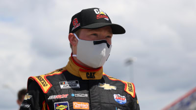 DARLINGTON, SOUTH CAROLINA - MAY 17:  Tyler Reddick, driver of the #8 Caterpillar Chevrolet, stands on the grid during the NASCAR Cup Series The Real Heroes 400 at Darlington Raceway on May 17, 2020 in Darlington, South Carolina. (Photo by Chris Graythen/Getty Images) | Getty Images