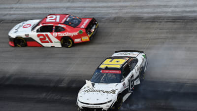 BRISTOL, TENNESSEE - JUNE 01: AJ Allmendinger, driver of the #16 Ellsworth Advisors Chevrolet, spins as Myatt Snider, driver of the #21 TaxSlayer Chevrolet, passes during the NASCAR Xfinity Series Cheddar's 300 presented by Alsco at Bristol Motor Speedway on June 01, 2020 in Bristol, Tennessee. (Photo by Jared C. Tilton/Getty Images) | Getty Images