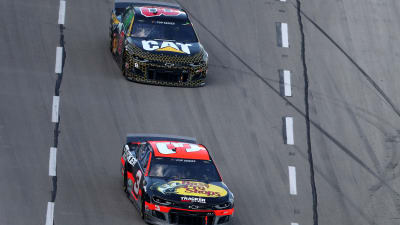 FORT WORTH, TEXAS - JULY 19: Austin Dillon, driver of the #3 Bass Pro Shops Chevrolet, leads Tyler Reddick, driver of the #8 Cat Oil & Gas Chevrolet, during the NASCAR Cup Series O'Reilly Auto Parts 500 at Texas Motor Speedway on July 19, 2020 in Fort Worth, Texas. (Photo by Tom Pennington/Getty Images) | Getty Images