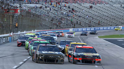 FORT WORTH, TEXAS - JULY 19: Austin Dillon, driver of the #3 Bass Pro Shops Chevrolet, and Tyler Reddick, driver of the #8 Cat Oil & Gas Chevrolet, lead the field to a restart during the NASCAR Cup Series O'Reilly Auto Parts 500 at Texas Motor Speedway on July 19, 2020 in Fort Worth, Texas. (Photo by Brian Lawdermilk/Getty Images) | Getty Images