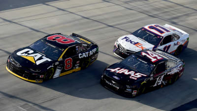 DOVER, DELAWARE - AUGUST 23: Tyler Reddick, driver of the #8 Cat App Chevrolet, Clint Bowyer, driver of the #14 Haas Automation Ford, and Denny Hamlin, driver of the #11 FedEx Office Toyota, race during the NASCAR Cup Series Drydene 311 at Dover International Speedway on August 23, 2020 in Dover, Delaware. (Photo by Jared C. Tilton/Getty Images) | Getty Images