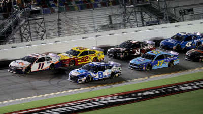 DAYTONA BEACH, FLORIDA - AUGUST 29: Denny Hamlin, driver of the #11 FedEx Express Toyota, and Tyler Reddick, driver of the #8 Chevrolet, lead the pack during the NASCAR Cup Series Coke Zero Sugar 400 at Daytona International Speedway on August 29, 2020 in Daytona Beach, Florida. (Photo by Chris Graythen/Getty Images) | Getty Images