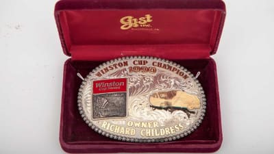 As a token for winning the Winston Cup Championship, each driver and owner was given an oval-shaped, silver belt buckle at the end of year banquet. Childress collected six – one for each of his championships.