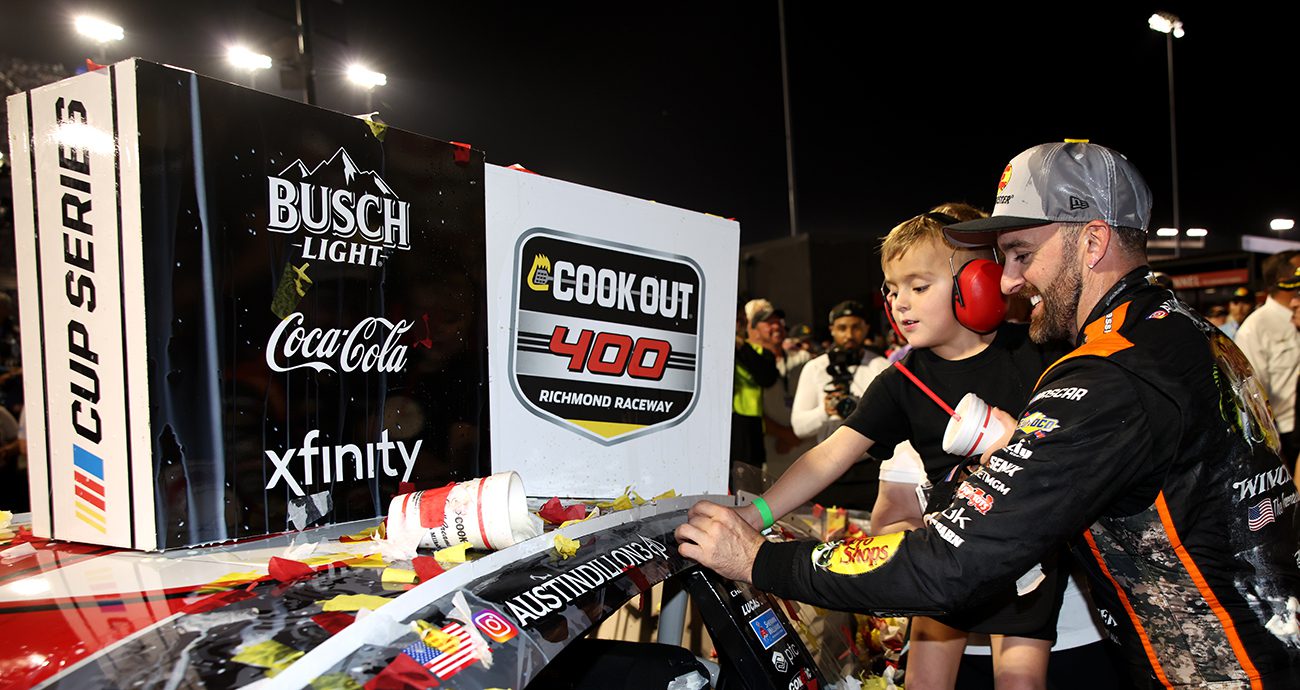 Austin Dillon places the winner sticker on his No. 3 Richard Childress Racing Chevrolet after his NASCAR Cup Series win at Richmond Raceway.