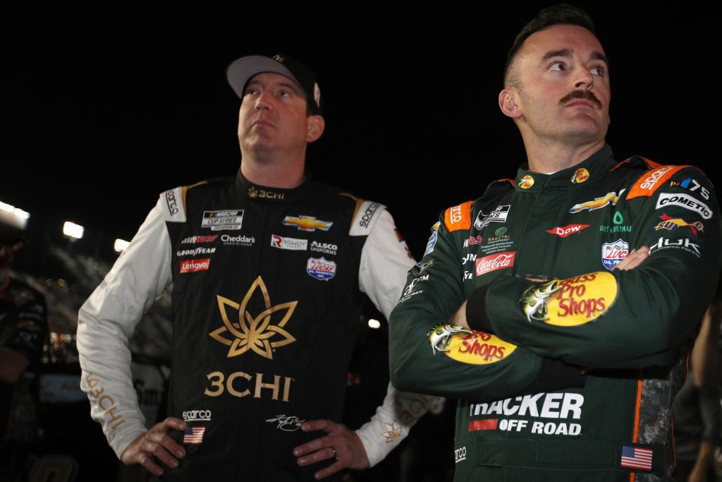 DAYTONA BEACH, FLORIDA - FEBRUARY 15: Kyle Busch, driver of the #8 3CHI Chevrolet, (L) and Austin Dillon, driver of the #3 Bass Pro Shops Club Chevrolet, look on during qualifying for the Busch Light Pole at Daytona International Speedway on February 15, 2023 in Daytona Beach, Florida. (Photo by Sean Gardner/Getty Images)