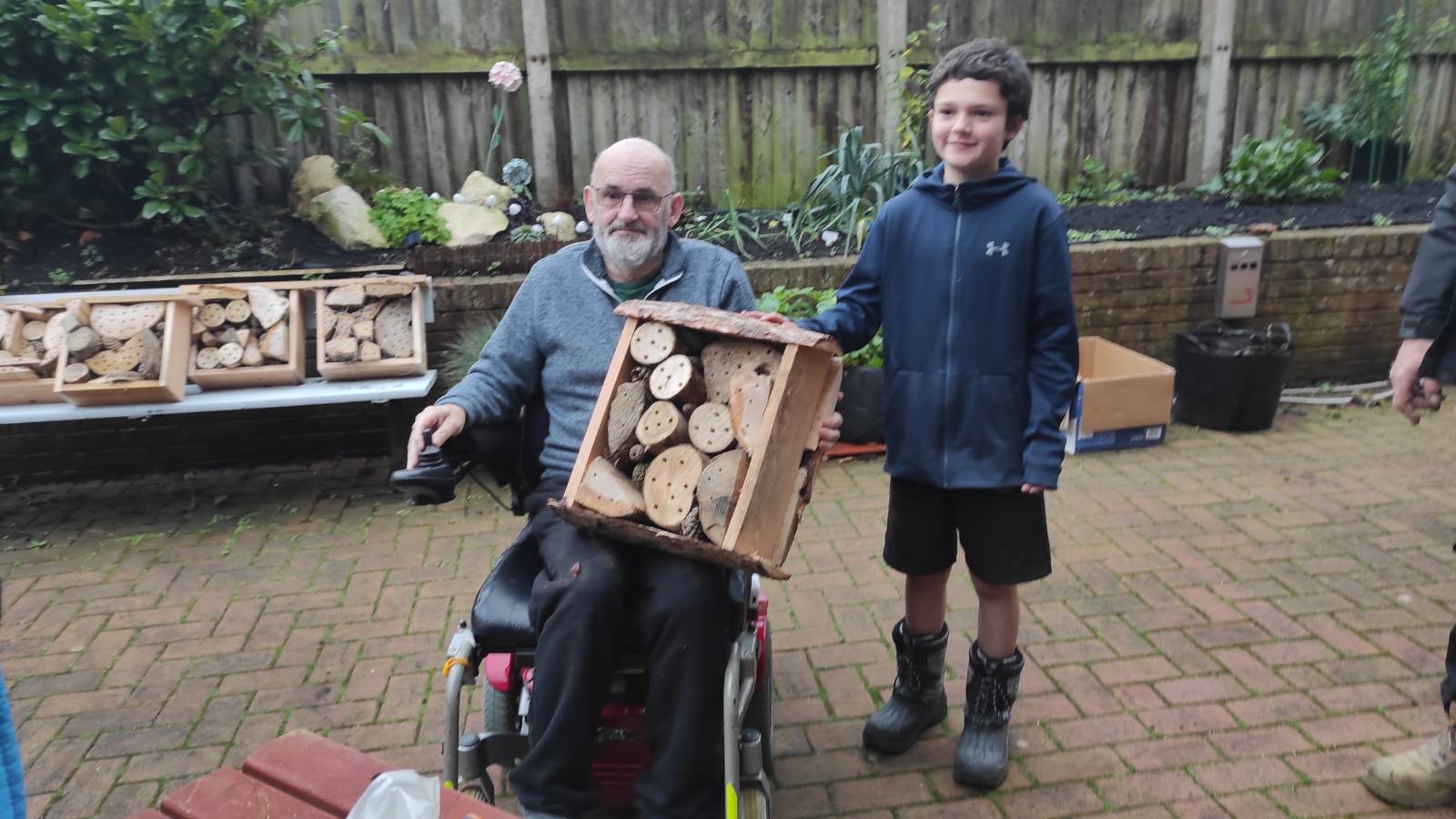 Resident and student with finished bug hotel!