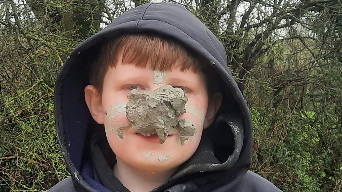 Student with a clay nose